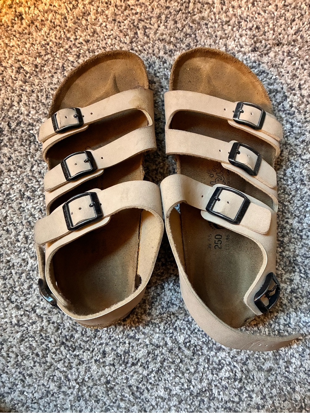 Birkenstock women’s  Triple-Strap Sandals in Light Beige